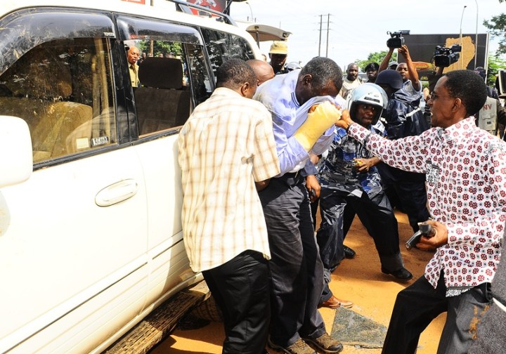 Too much Pepper Spray rendered Kizza Besigye and some of his supporter helpless before being arrested on April 28, 2011